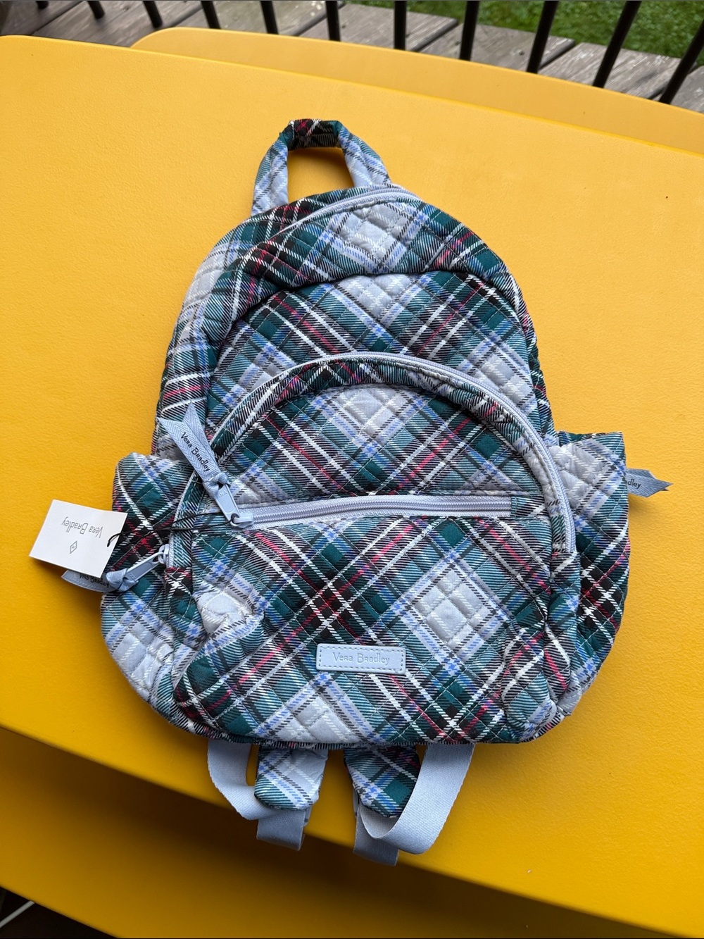 Vera Bradley Plaid Quilted Mini Backpack in Teal, White, Black, Green, Burgundy.
